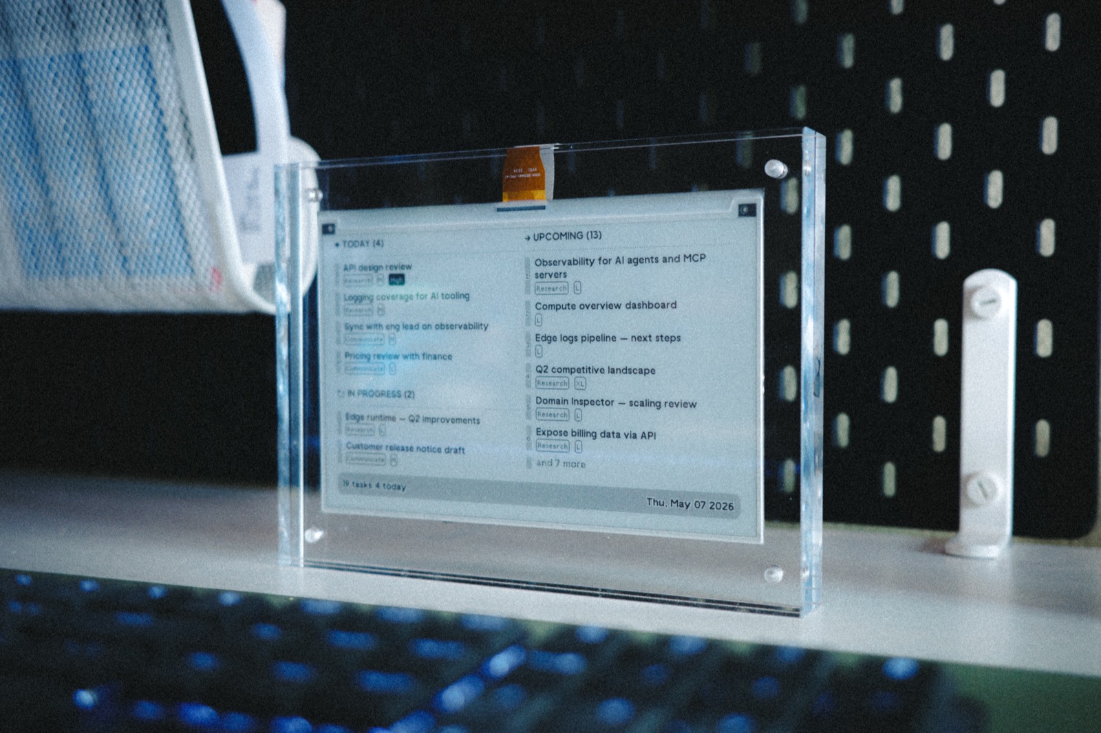 Close-up of the TRMNL panel rendering the Notion kanban: Today, In Progress, Upcoming